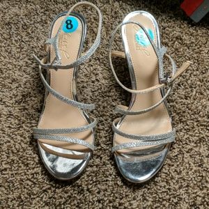 Strappy silver heels
